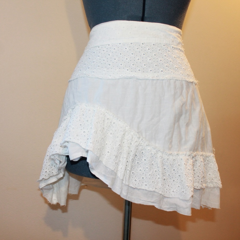 Asymmetrical white linen skirt with sewn details